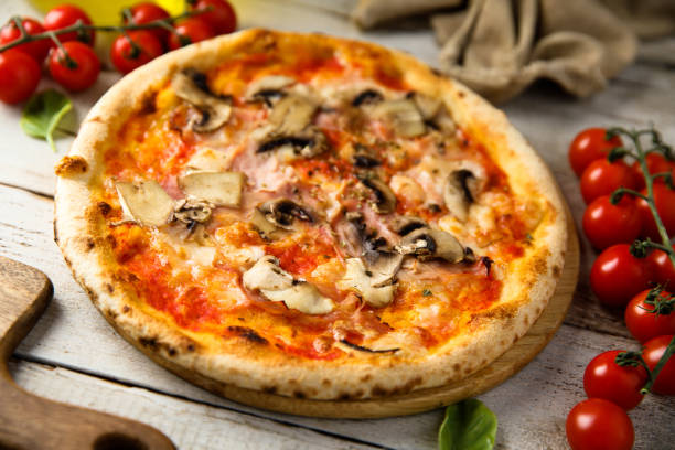 istock Pizza with mushroom and ham 1351448164