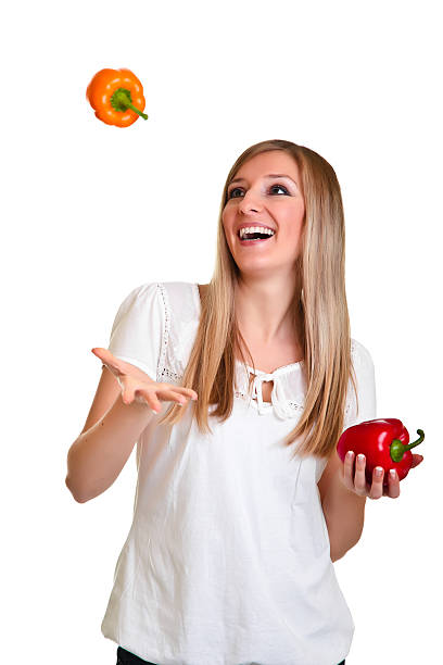 istock Woman with vegetables isolated on white 135144911