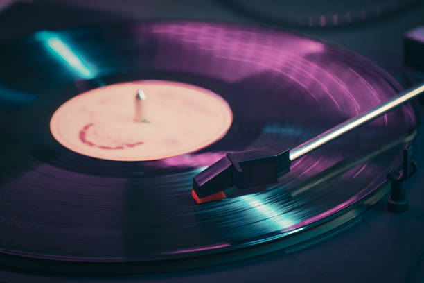 istock Vinyl record player is playing sound from LP album. 1351449306