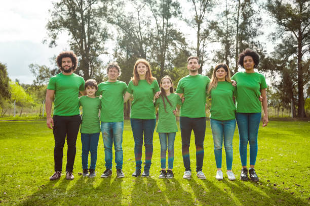istock Volunteers at park during environmental cleanup 1351452601