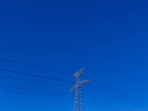 istock high voltage electric tower on clean blue sky 1351455156