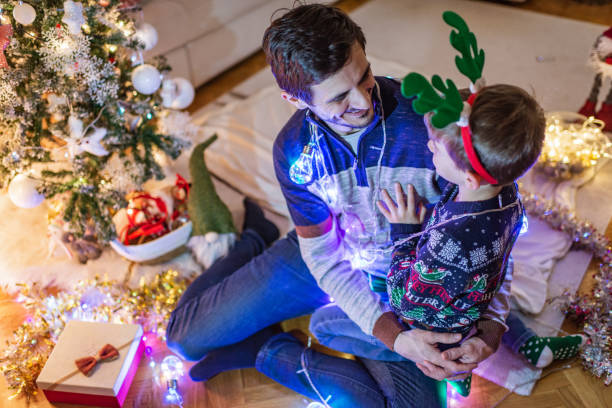 istock Happy family on Christmas Eve 1351457832