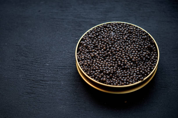 istock Black caviar close up isolated black background 1351458002
