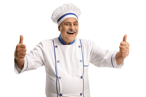 istock Cheerful mature male chef showing both thumbs up 1351458539