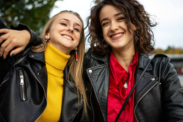 istock Two young woman having fun outdoors 1351462640