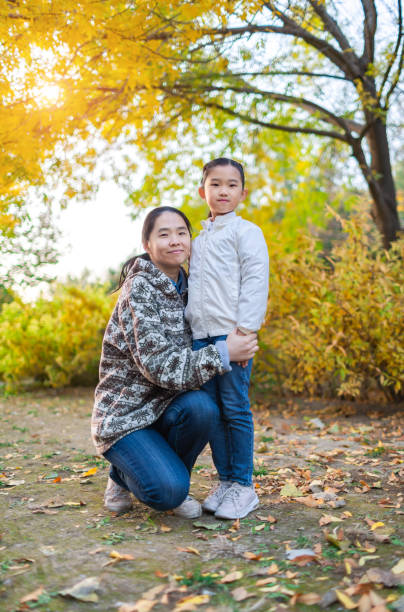 istock Mother and Daughter in Autumn 1351462644