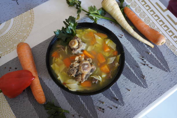 istock Super taisty beef tail soup bowl and vegetables 1351464496