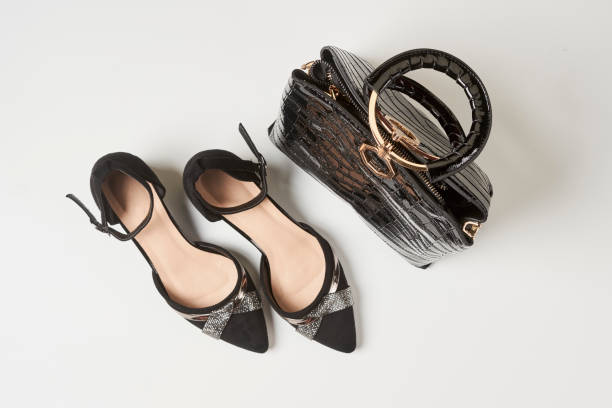 istock Black leather womens shoes and bag 1351466648
