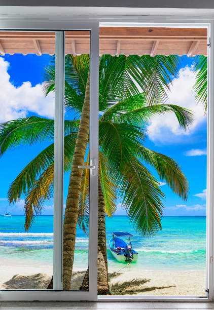 istock large glass door overlooking the beach 1351469625