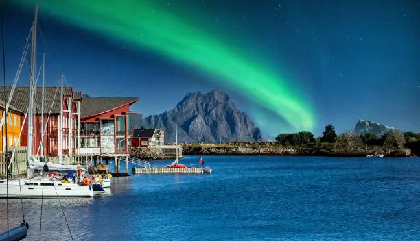 Dock of the north of norway with the mountains in the background