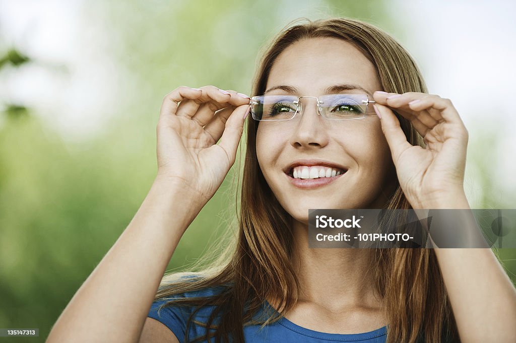 portrait charming young woman glasses portrait charming young woman glasses smiling background summer nature Adult Stock Photo