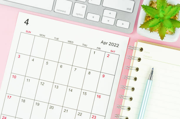 istock The April 2022 calendar sheet with keyboard computer 1351475319
