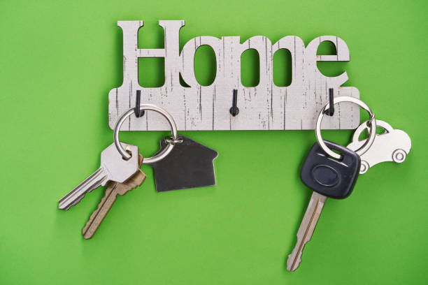istock house key and car key on key hanger 1351482860