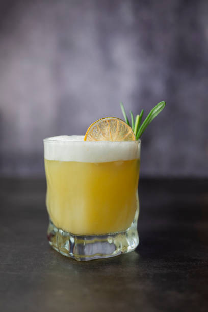 istock cocktail drink alcoholic whiskey sauer with lime 1351483222