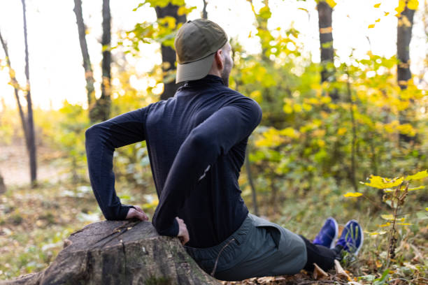 istock A young man doing training with the help of a stump 1351486326