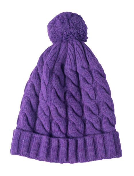istock women's hat knitted with pompon isolated on white background. warm winter accessory 1351486452