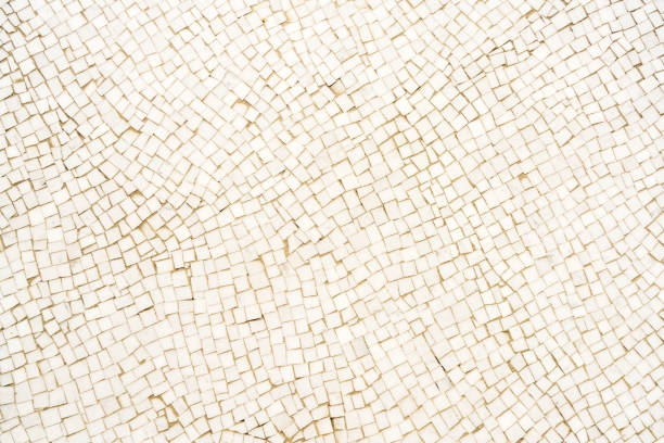White mosaic tiled floor surface close-up stock photo