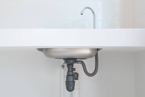 istock Drain pipe or sewer under kitchen sink for drain water and waste. 1351494203