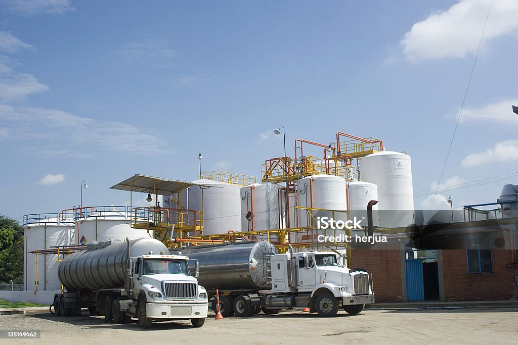 Chemical Storage Tank And Tanker Truck Chemical Industry, Storage Tank And Tanker Truck In Industrial Plant Storage Tank Stock Photo