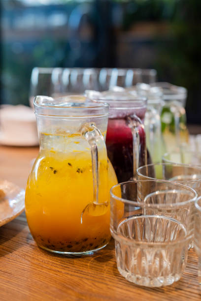 istock delicious drink lemonade fruit passion fruit in a glass decanter 1351494852