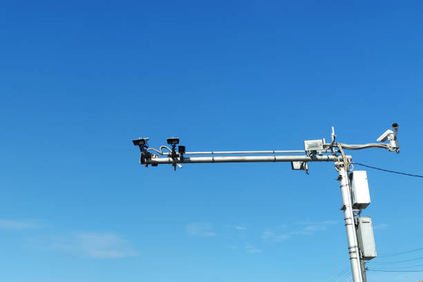 road cameras on a pole against the sky ckose-up