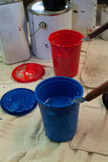 istock plastic cups of red and blue silkscreen ink 1351512759