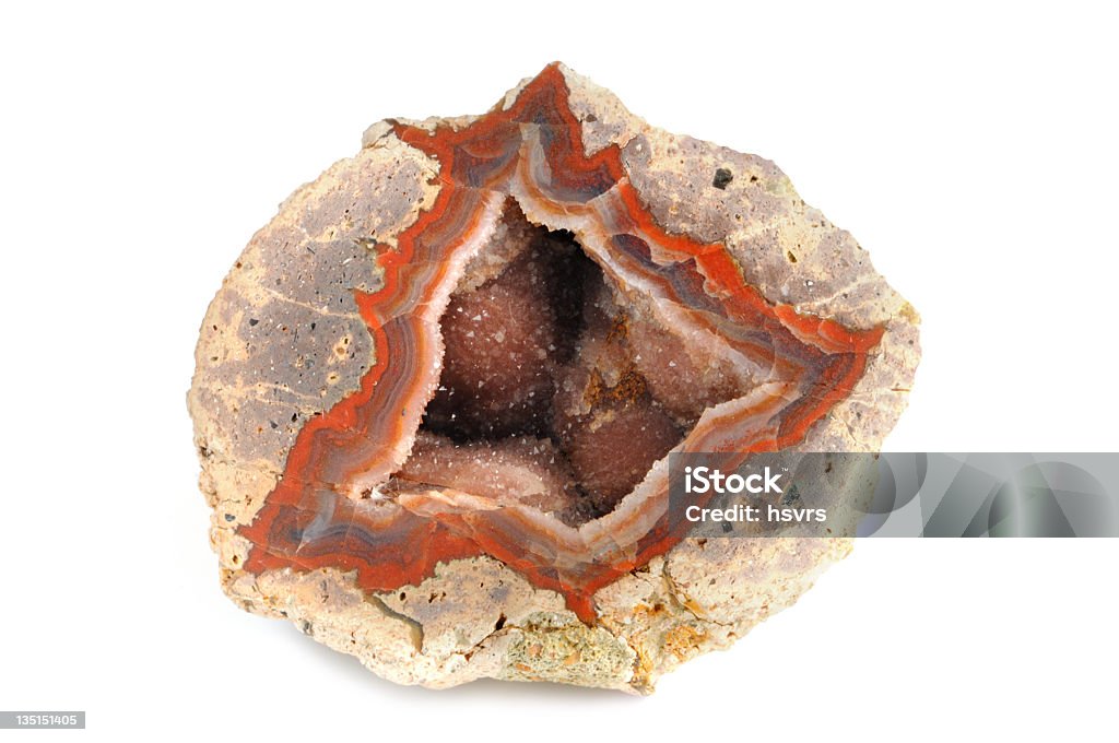 red banded agate on white background - Achat red banded agate on white background. inside white quartz crystals Agate Stock Photo