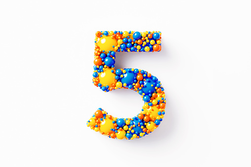 Colorful number 5 made of many spheres sitting on white background. Horizontal composition with clipping path and copy space. Directly above.
