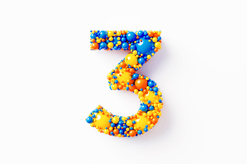 Colorful number 3 made of many spheres sitting on white background. Horizontal composition with clipping path and copy space. Directly above.