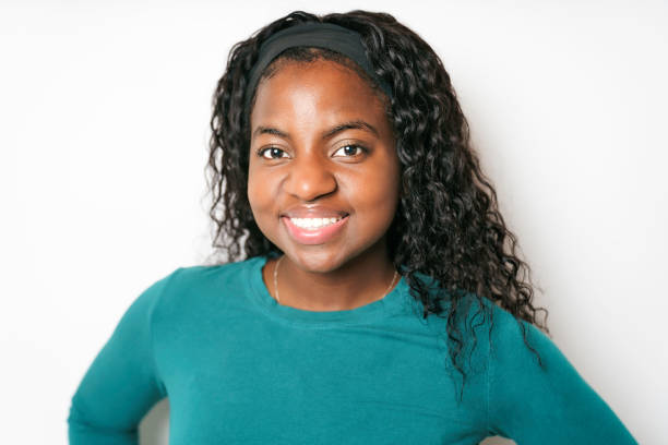 istock Young African Woman smiling on White Background 1351514511