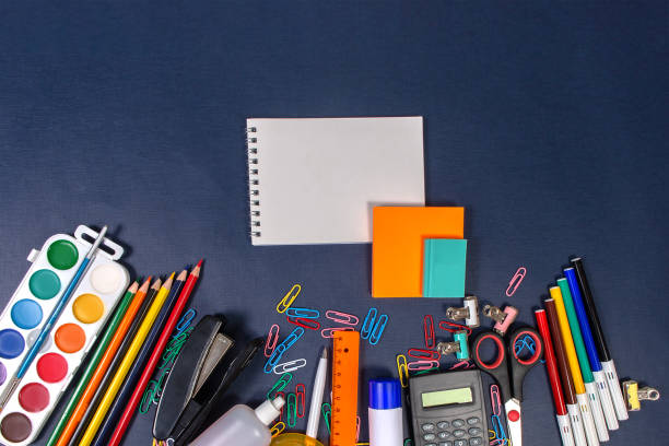 istock School items on the blue table. Back to school 1351515957