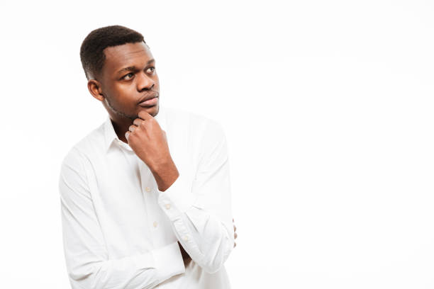 istock Serious young african man looking aside. 1351517537