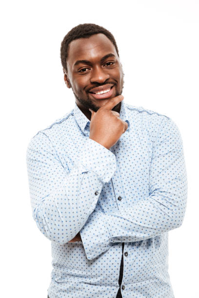 istock Smiling young african man dressed in shirt 1351517667