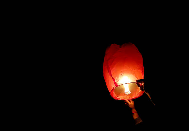 istock The Chinese lantern flies up in the sky 1351517729