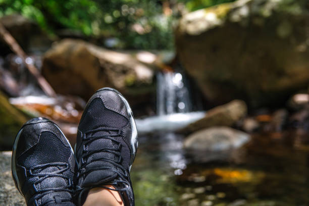 istock Feet Of An Unrecognizable Hiker Resting 1351517948