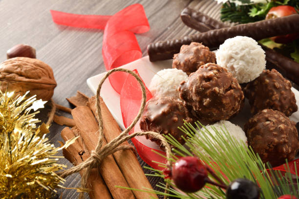 istock Chocolate and coconut balls on christmas table close up 1351518862