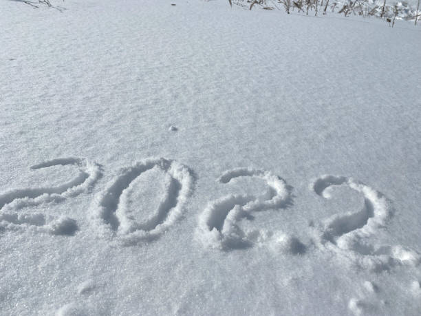 istock Inscription 2022 on the snow. 1351520256