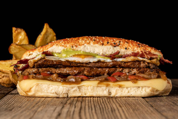 istock Meat sandwich with ham cheese and egg 1351520391