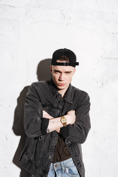 istock Vertical image of cool hipster in snap back 1351520412