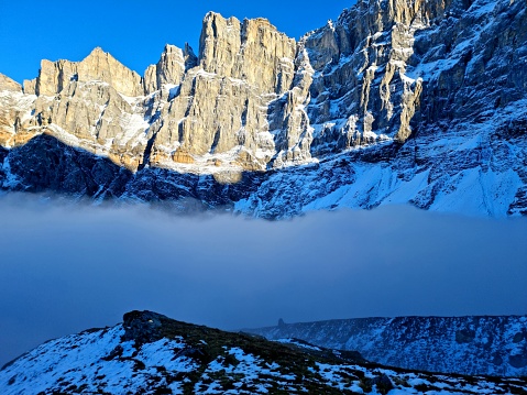Mountains in Mist. The image shows several mountain peaks in the swiss Alps (Canton of Glarus) at an altitute of 2400m.