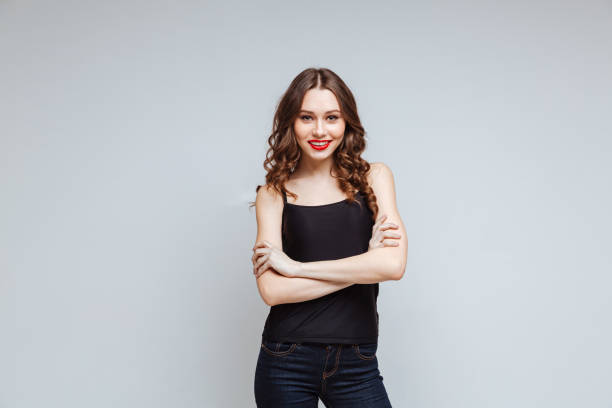 istock Smiling woman with crossed arms 1351522510