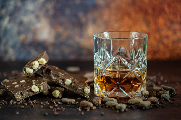istock Whiskey, chocolate pieces and cocoa beans. 1351524886