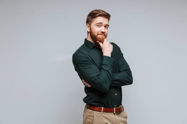 istock Pensive Bearded man in shirt 1351525476