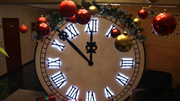 istock Large round colorful clock decorated for Christmas 1351527555