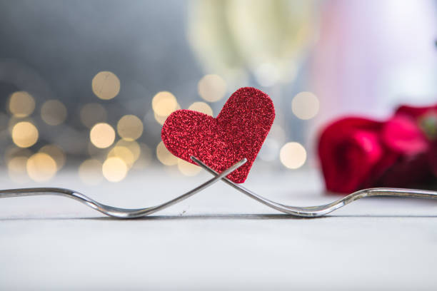 istock Forks and a heart. Holiday menu for Valentines Day. 1351528878