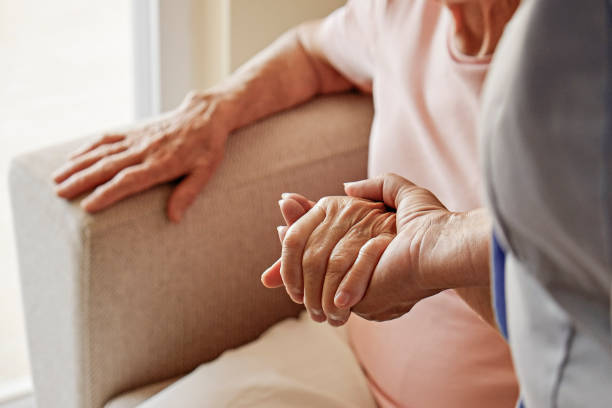 istock Senior lady with professional caregiver. 1351530674