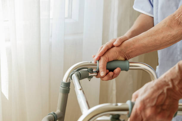 istock Senior lady with professional caregiver. 1351530871