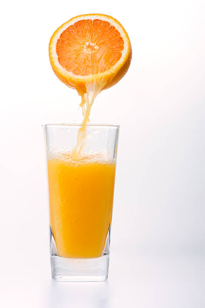 istock Juice to pour from orange 135153479