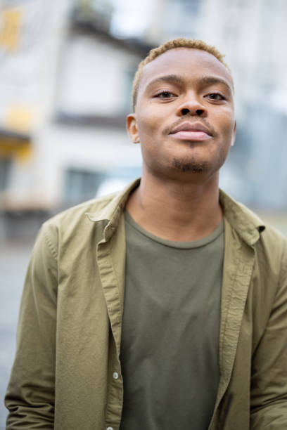 istock Portrait of young black guy looking at camera 1351536227