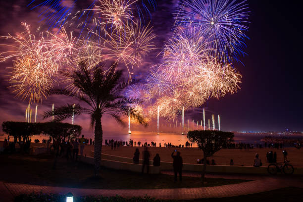 Amazing New Years firework show in Marjan Island in Ras al Khaimah emirate of UAE Amazing New Years eve celebration firework show above the seaside coast in Marjan Island in Ras al Khaimah emirate of United Arab Emirates aerial view firework display pyrotechnics celebration excitement stock pictures, royalty-free photos & images